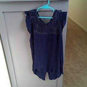 Girls beautiful navy blue sleeveless top w a longer back hem